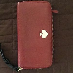 Pretty Kate Spade maroon wallet.